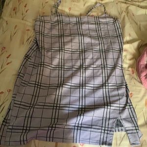 Purple dress tight and stretchy .